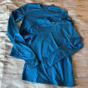 Set of two REI midweight base layer crew neck long sleeved shirts